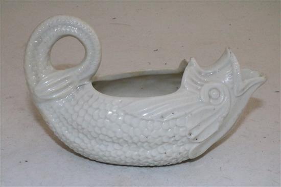 A soft paste porcelain dolphin sauceboat, 18th century, possibly Saint-Cloud or Mennecy, length 14.5cm (5.7in.)